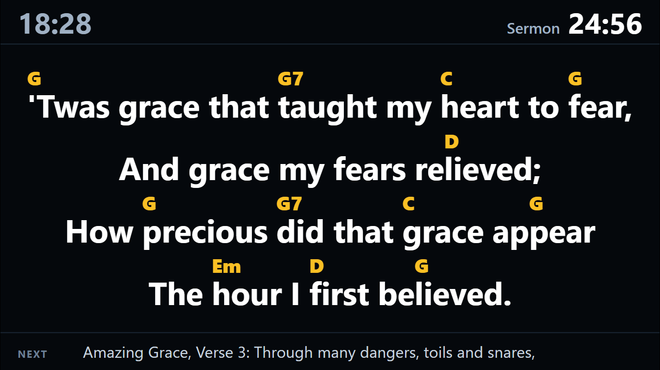 The preacher and band screen: the time, a sermon countdown, the words with chords above them, and the next verse